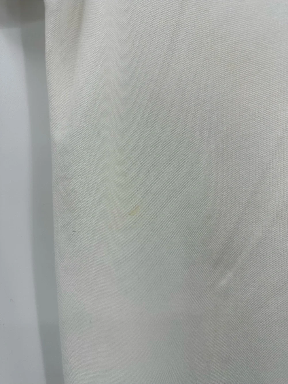 Banana Republic White Polo with Subtle Elephant Logo